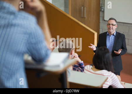 Happy lecturer speaking to his class Stock Photo