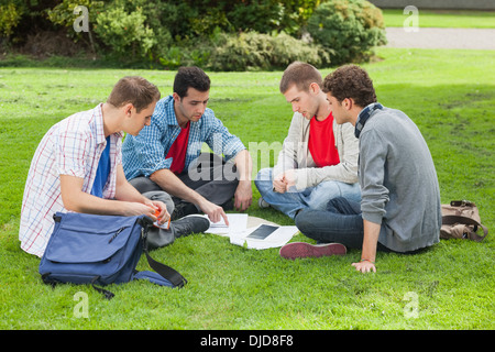 Students studying together outside on campus Stock Photo