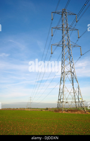 Electricity Power Lines cross Cotswold Farmland at Cleeve Common Stock Photo