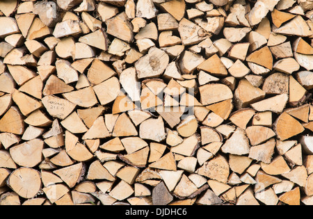 Store of logs for wood burning stove, England, UK Stock Photo