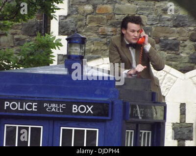 Matt Smith Matt Smith filming a scene for series seven of the popular BBC sci-fi series Dr Who. The Doctor, climbs a ladder and changes a bulb in the lamp on the top of the TARDIS. He proceeds to leave a voice-mail message for Amy Pond and Rory Williams. Stock Photo