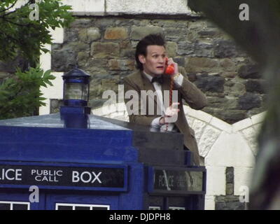 Matt Smith Matt Smith filming a scene for series seven of the popular BBC sci-fi series Dr Who. The Doctor, climbs a ladder and changes a bulb in the lamp on the top of the TARDIS. He proceeds to leave a voice-mail message for Amy Pond and Rory Williams. Stock Photo