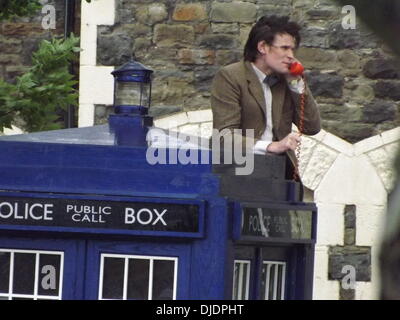 Matt Smith Matt Smith filming a scene for series seven of the popular BBC sci-fi series Dr Who. The Doctor, climbs a ladder and changes a bulb in the lamp on the top of the TARDIS. He proceeds to leave a voice-mail message for Amy Pond and Rory Williams. Stock Photo