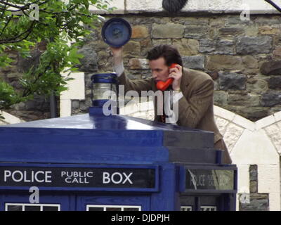 Matt Smith Matt Smith filming a scene for series seven of the popular BBC sci-fi series Dr Who. The Doctor, climbs a ladder and changes a bulb in the lamp on the top of the TARDIS. He proceeds to leave a voice-mail message for Amy Pond and Rory Williams. Stock Photo