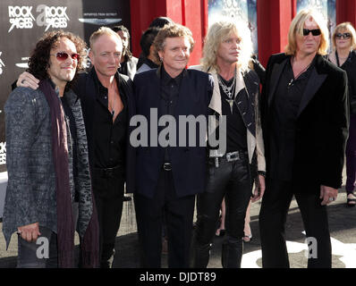 Def Leppard (L-R) Vivian Campbell, Phill Collen, Rick Allen, Rick Savage, and Joe Elliott Premiere of Warner Bros. Pictures' 'Rock Of Ages' at Grauman's Chinese Theatre - Arrivals Hollywood, California - 08.06.12 Stock Photo
