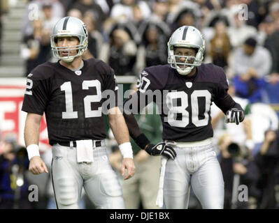 Jan 12, 2003; Oakland, CA, USA; Oakland Raiders quarterback Rich Gannon and wide receiver Jerry Rice. Stock Photo