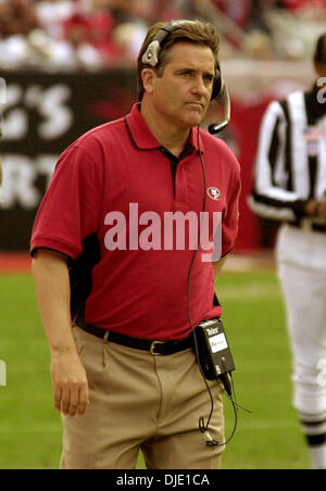 Jan 12, 2003; Tampa Bay, FL, USA; San Francisco Forty Niner head coach Steve Mariucci looks up at the clock during their Division Playoff game against the Tampa Bay Bucaneers Sunday January 12,2003 at Raymond James stadium in Tampa Florida Stock Photo