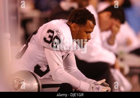 Jan 26, 2003 - San Diego, California, USA - Clarence Love sits on the bench during the fourth quarter of Super Bowl XXXVII between the Oakland Raiders and the Tampa Bay Buccaneers, at Qualcomm Stadium. (Credit Image: © Hector Amezcua/Sacramento Bee/ZUMA Press) RESTRICTIONS: USA Tabloids RIGHTS OUT! Stock Photo