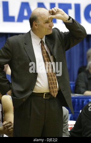 Mar 11, 2004; Dayton, OH; USA; Hawks coach PHIL MARTELLI rubs his head while he watches play in the 2nd half of the Atlantic 10 Championship Quarterfinal Round between the 27-0 Saint Joseph's Hawks and the Xavier Musketeers. Xavier defeated the #1 ranked and undefeated St. Joseph's Hawks 87-67. Stock Photo