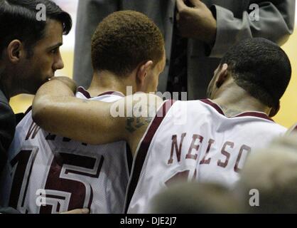 Mar 11, 2004; Dayton, OH; USA; St. Joseph's assistant coach MATT BRADY, left, listens as JAMEER NELSON, right, puts his arm around teammate DELONTE WEST, center, on the bench near the end of No. 1 St. Joseph's 87-67 loss to Xavier in the quarterfinals of Atlantic 10 tournament. It was St.Joseph's first loss of the season. Stock Photo