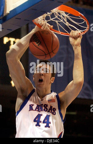 Mar 26, 2004; St. Louis, MO, USA; Kansas' DAVID PAGETT comes down with a dunk Friday night March 26, 2004 at the Edward Jones Dome in St. Louis, Mo. during the Jayhawks' Sweet 16 game against the UAB Blazers. Stock Photo