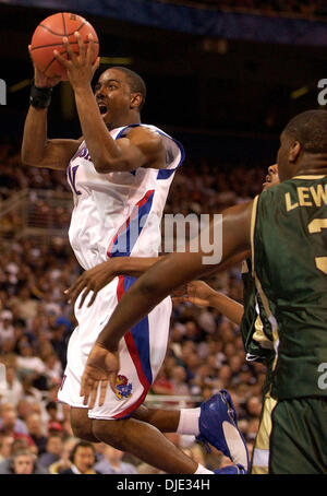 Mar 26, 2004; St. Louis, MO, USA;  Kansas' AARON MILES drives to the hoop Friday night March 26, 2004 at the Edward Jones Dome in St. Louis, Mo. during their Sweet 16 win over the UAB Blazers. Stock Photo