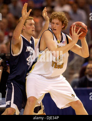 Mar 26, 2004; St. Louis, MO, USA; Georgia Tech's LUKE SCHENSCHER holds his position Friday night March 26, 2004 at the Edward Jones Dome in St. Louis, Mo. against Nevada's SEAN PAUL during the first half game of their Sweet 16 game. Stock Photo