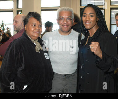 Mar 28, 2004; New York City, NY, USA; Boxer JACQUELINE FRAZIER-LYDE daughter of J. Frazier (R), poses with Grandmaster Ron Van Clief, (10th degree red belt), and boxer and trainer Jackie Tonawanda (L) at the Grand Nationals Open Karate Tournament in NYC. Stock Photo