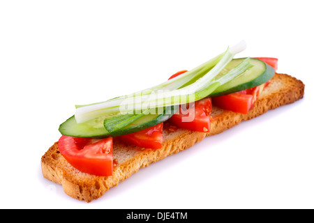 Long rusk sandwich with tomato, cucumber and onion isolated on white background. Stock Photo