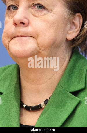 Berlin, Germany. 27th Nov, 2013. German Chancellor Angela Merkel attends a press conference in Berlin, Germany, on Nov. 27, 2013. Leaders from Germany's main parties signed provisionally a coalition agreement on Wednesday, paving the road for forming a new government two months after a federal election. Credit:  Zhang Fan/Xinhua/Alamy Live News