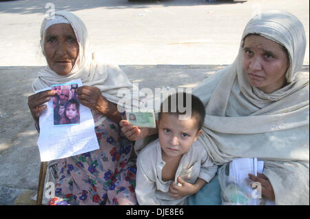 Relatives of missing persons are protesting against kidnapping and missing of their beloveds and demanding to Chief Justice for their recovery, during a demonstration arranged by Muttehida Qaumi Movement on the occasion of Karachi Unrest Case, at Supreme Court Registry in Karachi on Wednesday, November 27, 2013.