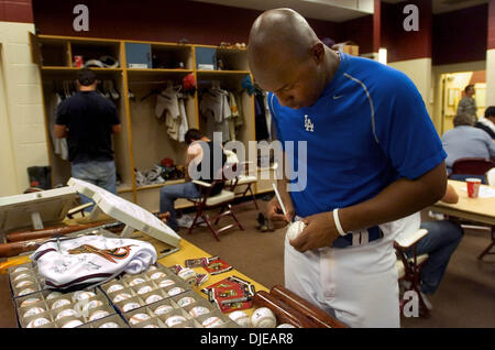 Jul 12, 2004; Sacramento, CA, USA; Pacific Coast League Las Vegas 51s second baseman JOE THURSTON signs commemorative All Star baseballs in the locker room at Raley Field in West Sacramento on Tuesday July 12, 2005. Thurston played for Sacramento City College in the late 1990's. Raley Field prepares to host the All-Star game tomorrow. Stock Photo