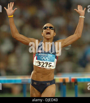 KRT SPORTS STORY SLUGGED: OLY-TRACK KRT PHOTO BY KARL MONDON/CONTRA COSTA TIMES (August 24) ATHENS, GREECE -- Joanna Hayes of the United States celebrates winning the gold medal in the 100-meter hurdles in the 2004 Olympic Games on Tuesday, August 24, 2004. (gsb) 2004 (Credit Image: Karl Mondon/Contra Costa Time/ZUMA Press) Stock Photo