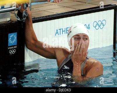 KRT SPORTS STORY SLUGGED: OLY-SWIMMING KRT PHOTO BY KARL MONDON/CONTRA COSTA TIMES (August 16) ATHENS, GREECE  -- Natalie Coughlin of the United States celebrates winning gold in the 100-meter backstroke on Monday, August 16, 2004, during the Olympic Games in Athens, Greece. (gsb) 2004 (Credit Image: Karl Mondon/Contra Costa Time/ZUMA Press) Stock Photo