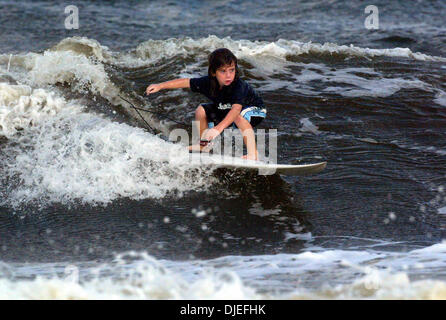 Oct 07, 2004; Ft. Pierce , FL, USA; 6-year old LUKE MARKS from Lantana surfed at the Boynton Beach Inlet on Thursday afternoon. He recently took 4th place in a local surf contest in the under-11 division. Stock Photo