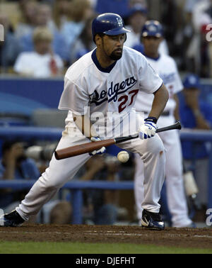 Oct 09, 2004; Los Angeles, CA, USA;  Pitcher JOSE LIMA from the Los Angeles Dodgers bunts the ball during the second inning againts the St. Louis Cardinals during game 3 of the division series at the Dodger's Stadium in Los Angeles, Saturday 9 October 2004. Stock Photo