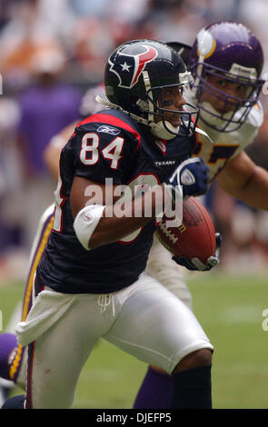 Oct 10, 2004; Houston, TX, USA; NFL Football: Houston Texans WR J.J. Moses carries the ball against Minnesota, Sunday October 10, 2004,during the second half at Reliant Stadium in Houston. Stock Photo