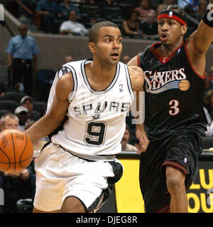 Oct 21, 2004; San Antonio, TX, USA; San Antonio Spurs' TONY PARKER drives around Sixers' ALLEN IVERSON at the SBC Center. The Sixers went on to win 97-95. Stock Photo