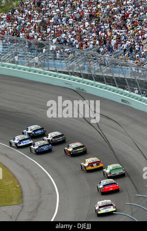 Nov 21, 2004; Homestead, FL, USA; Blackhawk helicopters fly over the crowd  at Homestead Miami Speedway during the opening ceremony Stock Photo - Alamy