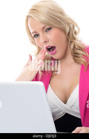 Model Released. Attractive Bored Young Business Woman Using a Laptop Computer Stock Photo