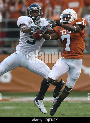 Sep 22, 2007 - Austin, TX, USA - NCAA Football: Texas Longhorns #7 Deon Beasley breaks up a pass intended for      Rice Owls #3 Toren Dixon in the 1st quarter of play at Darrell Royal Texas Memorial Stadium. The Texas Longhorns beat Rice 58-14. (Credit Image: © Delcia Lopez/San Antonio Express-News/ZUMA Press) RESTRICTIONS: US Tabloid Sales OUT! SAN ANTONIO and SEATTLE NEWS PAPERS  Stock Photo