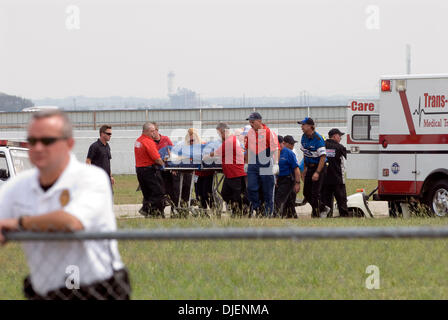 Sep 23, 2007 - Dallas, Texas, USA - NHRA drag racer John Force is airlifted after his devistating accident during the NHRA Fall Nationals in Dallas. Force broke his left ankle, critically dislocated his left wrist and suffered a severe abrasion to his right knee during a run with fellow NHRA legend Kenny Bernstein when His tire blew up at 315 mph. . PICTURED: front axel of his car. Stock Photo