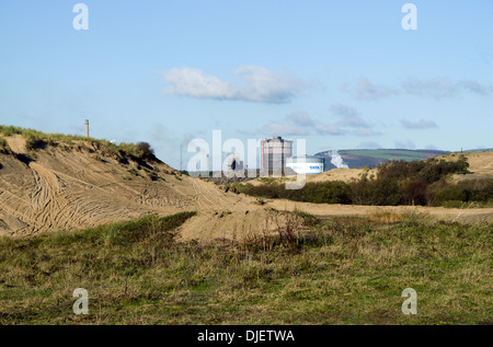 Port Talbot steel works from Kenfig national nature reserve South Wales uk Stock Photo