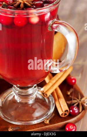 Hot mulled wine with berries Stock Photo