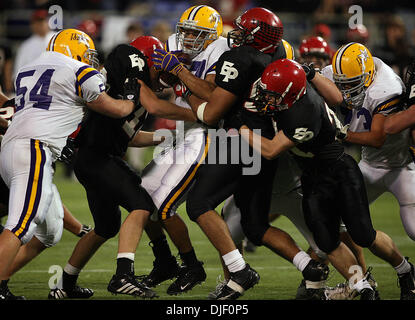 Nov 23, 2007 - Minneapolis, Minnesota, USA - Cretin-Derham Hall's SHADY SALAMON was tackled by three Eden Prairie defenders in the second half. Eden Prairie won the game 50-21 victory to capture the Class 5A Championship at the 2007 Minnesota State High School State Football Tournament at the Metrodome Friday, November 23.  (Credit Image: © Jim Gehrz/Minneapolis Star Tribune/ZUMA P Stock Photo