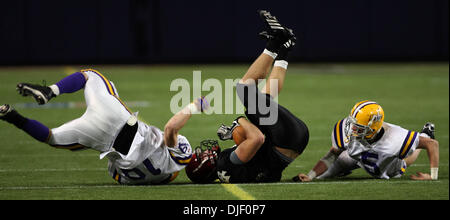 Nov 23, 2007 - Minneapolis, Minnesota, USA - Eden Prairie's JEFF BOWLSBY was tackled after a second half run by Cretin-Derham Hal's JOHN ONWUALU (left) and Dan Tipping in the Class 5A Championship at the 2007 Minnesota State High School State Football Tournament at the Metrodome Friday, November 23.  (Credit Image: © Jim Gehrz/Minneapolis Star Tribune/ZUMA Press) RESTRICTIONS: USA  Stock Photo