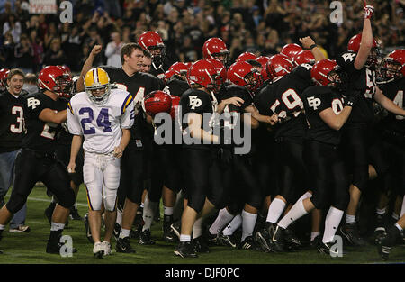 Nov 23, 2007 - Minneapolis, Minnesota, USA - Cretin-Derham Hall's JON KINSEL tried to get out of the way as players from Eden Prairie swarmed the field after their 50-21 victory in the Class 5A Championship game of the 2007 Minnesota State High School State Football Tournament at the Metrodome Friday, November 23.  (Credit Image: © Jim Gehrz/Minneapolis Star Tribune/ZUMA Press) RES Stock Photo