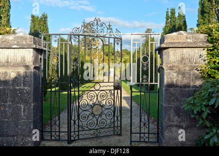 A vista down the garden - seen through decorative gates, Strokestown Park House, Strokestown, Co. Roscommon, Republic of Ireland Stock Photo