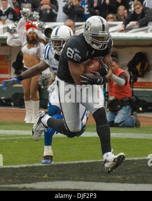 St. Louis Rams defender Ron Bartell (24) breaks up a pass in the end zone  against Oakland Raiders receiver Ronald Curry (89) in the fourth quarter.  The Rams defeated the Raiders, 20-0