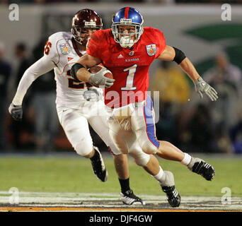 Jan 03, 2008 - Miami, Florida, USA -Kansas #1 tailback JAKE SHARP catches a pass for an 18-yard gain as Hokies #26 CODY GRIMM defends at the Orange Bowl in Miami, Florida. (Credit Image: © Allen Eyestone/Palm Beach Post/ZUMA Press) RESTRICTIONS: * USA Tabloids Rights OUT * Stock Photo