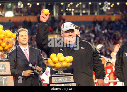 Jan 03, 2008 - Miami, Florida, USA -Head coach MARK MANGINO holds up an orange after Virginia Tech's 24-21 victory over Kansas in the FedEx Orange Bowl Thursday night. (Credit Image: © Bill Ingram/Palm Beach Post/ZUMA Press) RESTRICTIONS: * USA Tabloids Rights OUT * Stock Photo