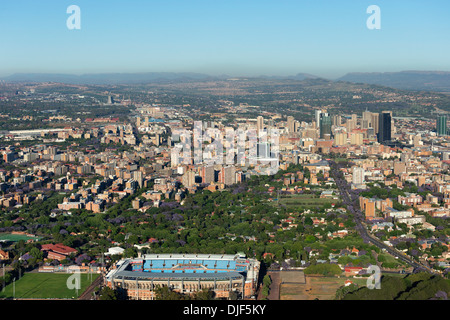 Aerial view of Pretoria's cental business district and the iconic Jacaranda trees in full bloom.Pretoria.South Africa Stock Photo