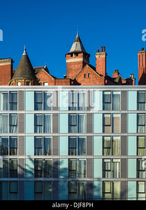 Architecture Old and New Modern Chelsea London. Grosvenor Waterside Apartments in the foreground and The Lister Hospital behind. Stock Photo