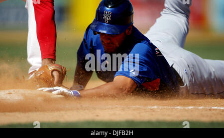 Feb 28, 2008 - Jupiter, Florida, USA - First baseman ALBERT PUJOLS (5), of the St. Louis Cardinals, attempts to tag out Fernando Martinez (67), of the New York Mets, from a throw from catcher Jason LaRue (21) during the Cardinals 7-0 win in a spring training game at Roger Dean Stadium in Jupiter Thursday. (Credit Image: © Gary Coronado/Palm Beach Post/ZUMA Press) RESTRICTIONS: * US Stock Photo
