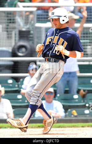 FIU Golden Panthers INF Garrett Wittels (10) scores.  The Texas A&M Aggies defeated the FIU Golden Panthers 17-3 in the NCAA regionals at Alex Rodriguez Park in Coral Gables, Florida. (Credit Image: © Ron Hurst/Southcreek Global/ZUMApress.com) Stock Photo