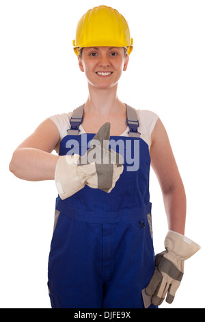 Young smiling carpenter showing thumbs up, isolated on white Stock Photo
