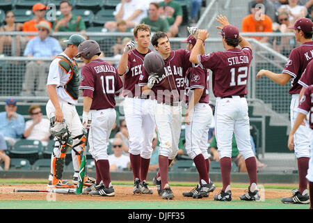 Texas A & M Aggies INF Matt Juengel (33) rounds second after homerun ...