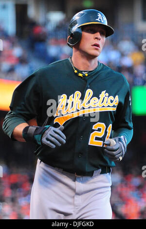 San Francisco, CA: Oakland Athletics' right fielder Ryan Sweeney (21) scores a run. The Giants won the game 6-2. (Credit Image: © Charles Herskowitz/Southcreek Global/ZUMApress.com) Stock Photo