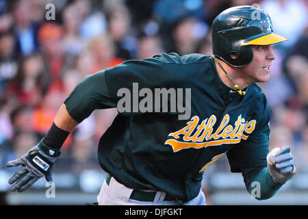 San Francisco, CA: Ryan Sweeney (21) runs to first base for the Oakland Athletics. The Giants won the game 6-2. (Credit Image: © Charles Herskowitz/Southcreek Global/ZUMApress.com) Stock Photo