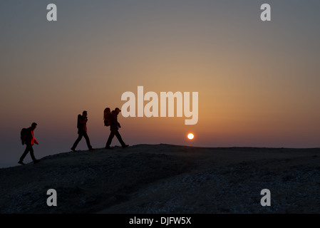 Trekking in mountains, greet the morning sun Stock Photo